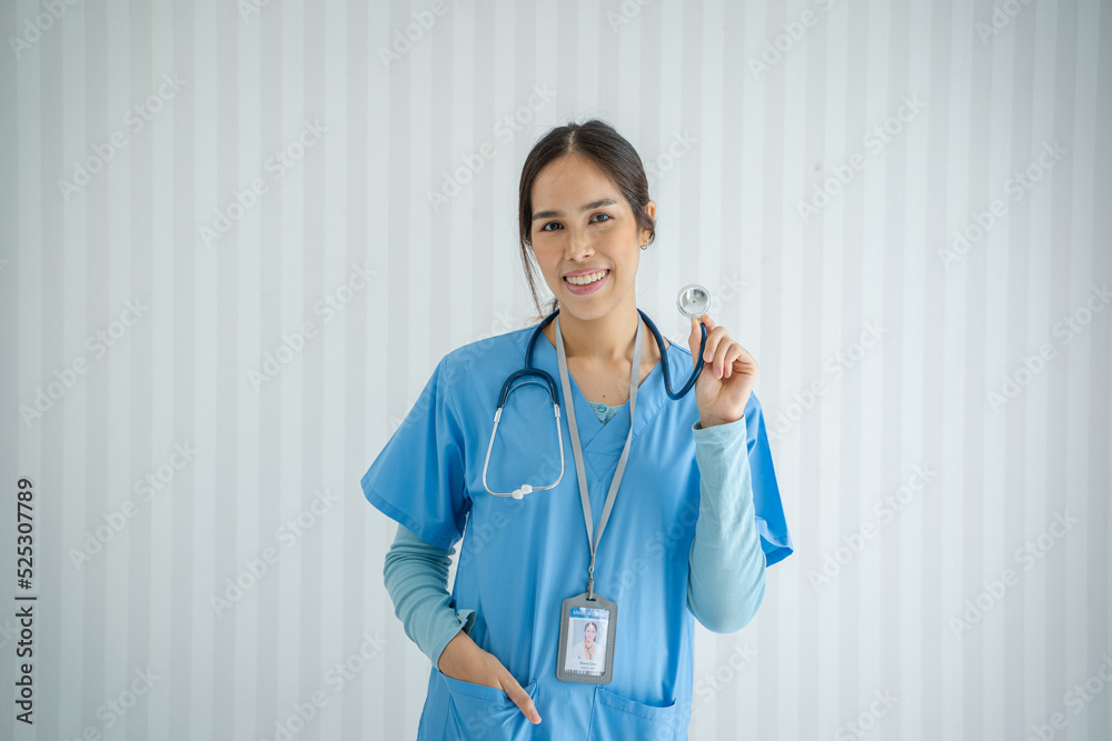 Smiling nurse woman with stethoscope in the office,Healthcare.