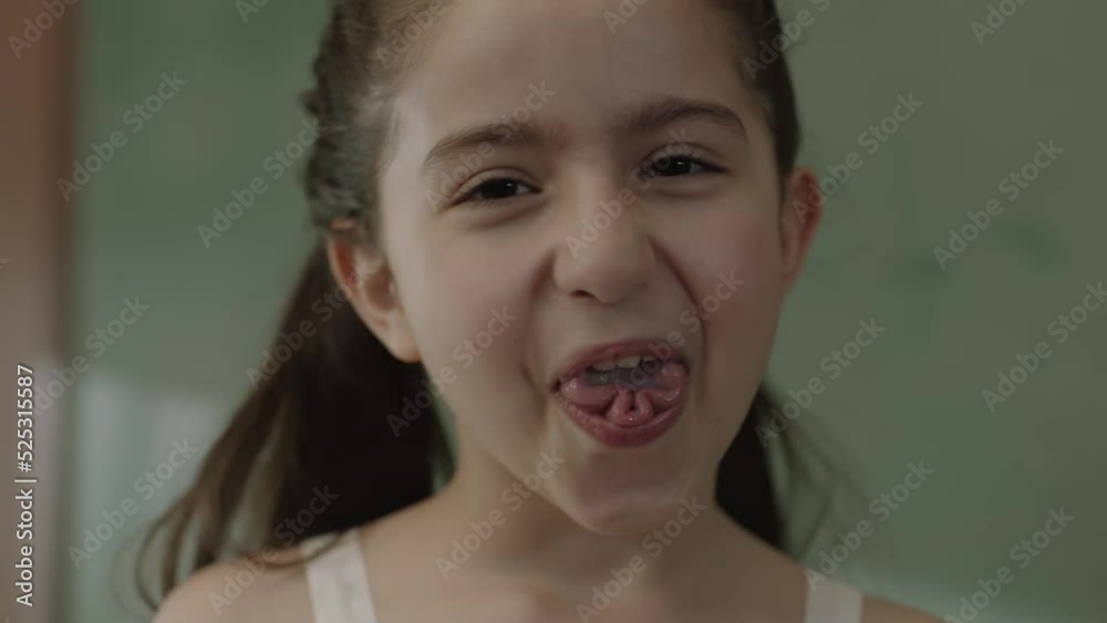 A girl's mouth is a trait inherited from her parents, with her