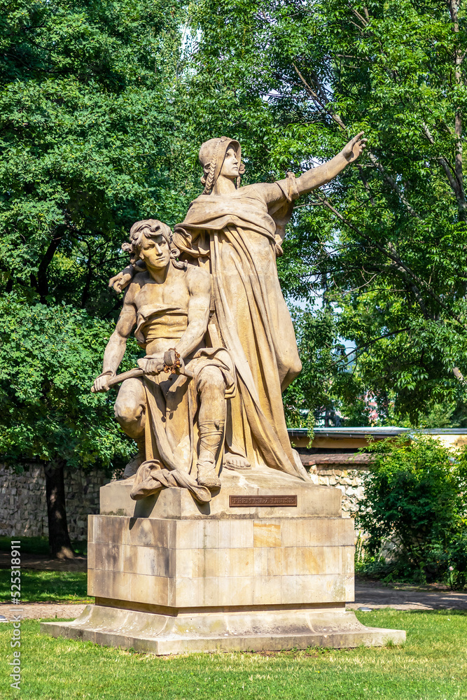 sculpture of slavic mythical figures - statues of Premysl and Libuse on pedestal in Vysehrad, Prague, Czech republic