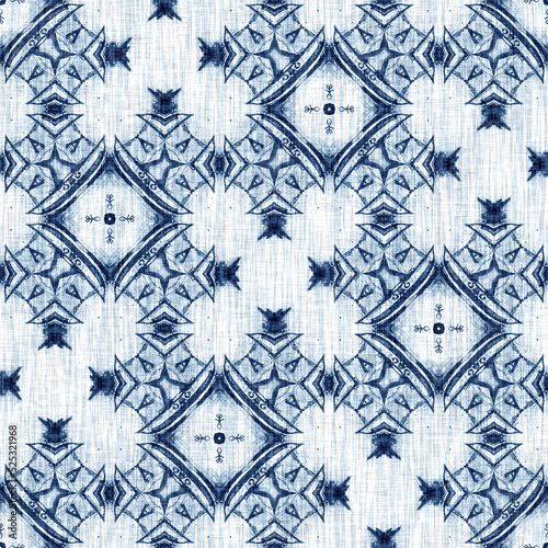 Indigo Dye Wash Coastal Damask Quilt Seamless Pattern. Washed out Geometric Dip Dyed Blur effect for Nautical and Marine Ocean Blue Interior Textile Backgrounds with Linen Texture Tile © Nautical