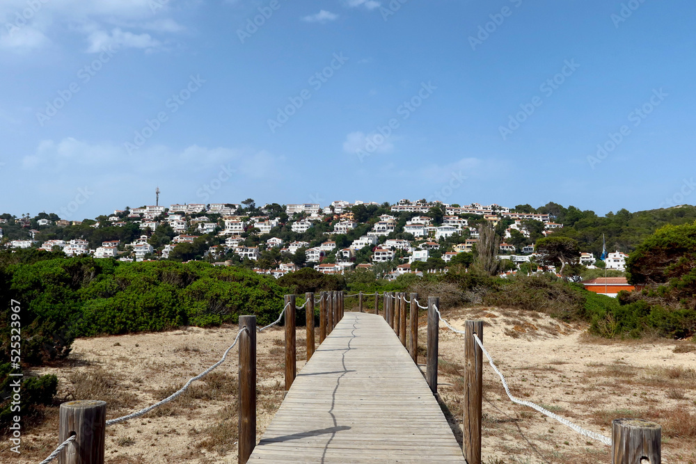 Son Bou, Menorca, Spain. View of the village from the salt marshes
