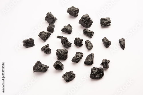 Shilajit is an ayurvedic medicine found primarily in the rocks of the Himalayas. selective focus photo