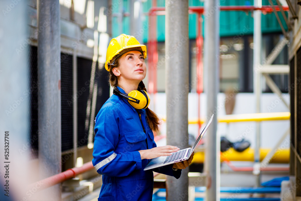 Close up hand industrial industrial plant with a tablet in hand, Engineer looking of working at industrial machinery setup in factory. Close up hand industrial industrial plant with a tablet in hand, Engineer looking of working at industrial machinery setup in factory.
