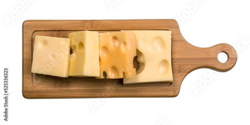 various types of cheese on wooden board photo