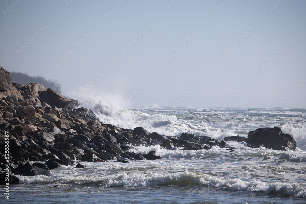 Ocean waves breaking on a rocky shore