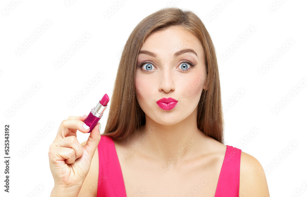 Beauty portrait of a young gir holding pink lipstick. Beauty portrait of a young gir holding pink lipstick.