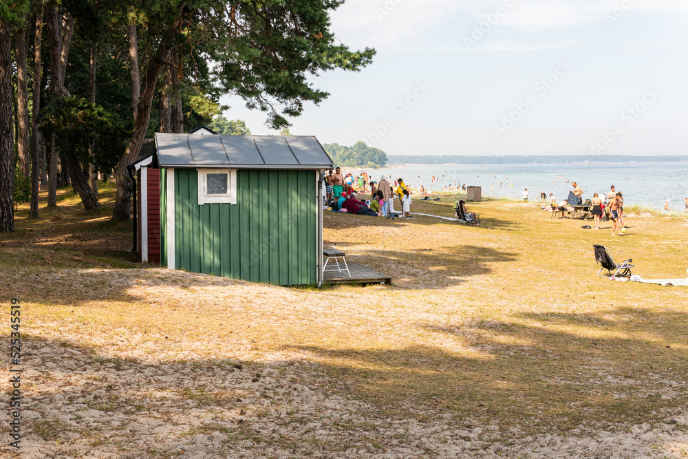 Sweden, Ahus – August 4, 2022: Crowded beach on a hot sunny summer day 