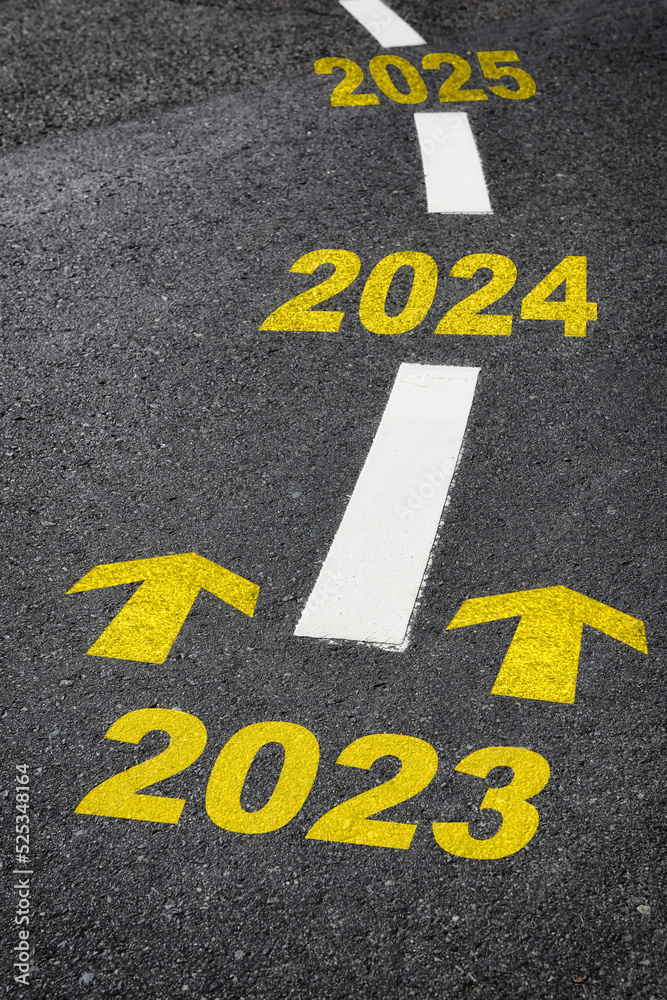 Road to year 2023, 2024, 2025 with yellow arrow marking on road. Making