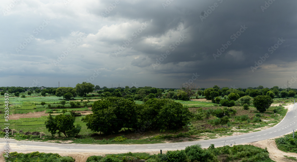 Scenic Village road on an overcast day near Agra, Uttar Pradesh, India