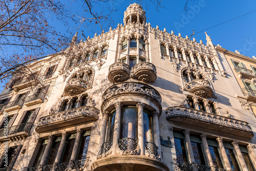 Passeig de Gracia, one of the main avenues in Eixample district of Barcelona, Spain photo