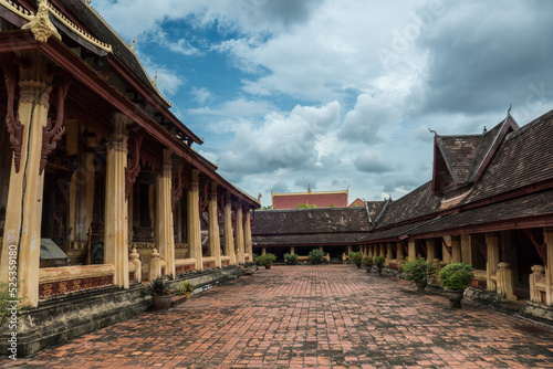 Wat Si Saket Temple in Vientiane, Laos. It was built in the Siamese style of Buddhist Art, with a surrounding terrace and an ornate five-tiered roof
