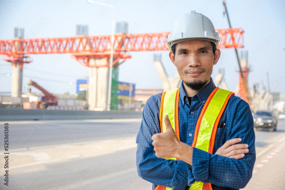 Asian Engineer construction are worker employee working by safety control helmet on site building Asian Engineer construction are worker employee working by safety control helmet on site building