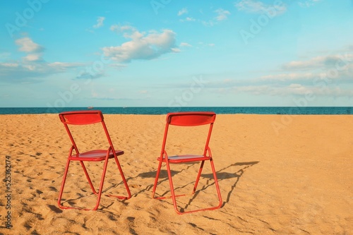 Fototapeta Naklejka Na Ścianę i Meble -  beach chairs on the beach