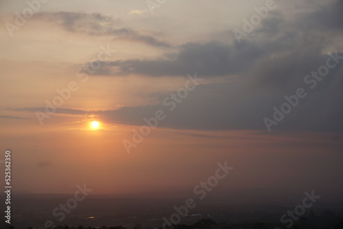 Sunrise over the hill. There are some clouds © Reka