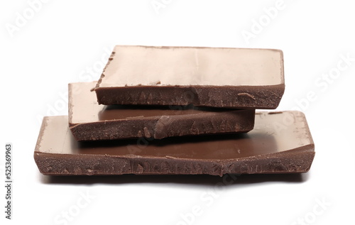 Dark chocolate with cocoa bars, pieces isolated on white  