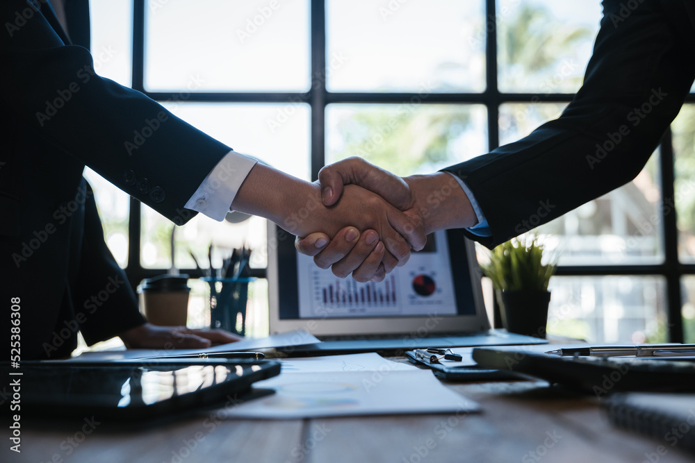 Close up of hands business person have a handshaking with partner and colleague during when finished working. Close up of hands business person have a handshaking with partner and colleague during when finished working.