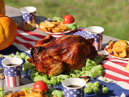 Thanksgiving Turkey Dinner. USA flag. National tradition. Outdoor.