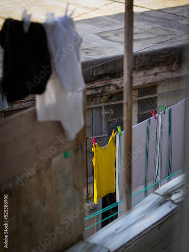 The typical style of former soviet buildings in the Baku city. Buildings with balcony and laundry