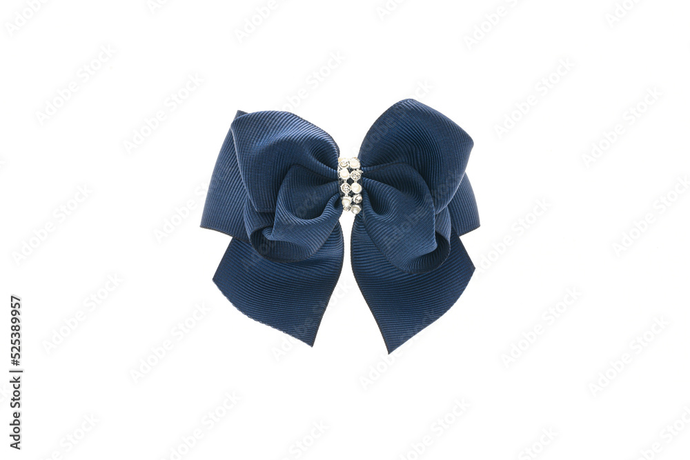 Blue satin bow for hair for girl, woman isolated on white background. Scrunchie hair clip accessory for girls and women. Close up Blue satin bow for hair for girl, woman isolated on white background. Scrunchie hair clip accessory for girls and women. Close up