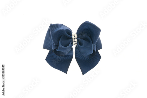 Blue satin bow for hair for girl, woman isolated on white background. Scrunchie hair clip accessory for girls and women. Close up