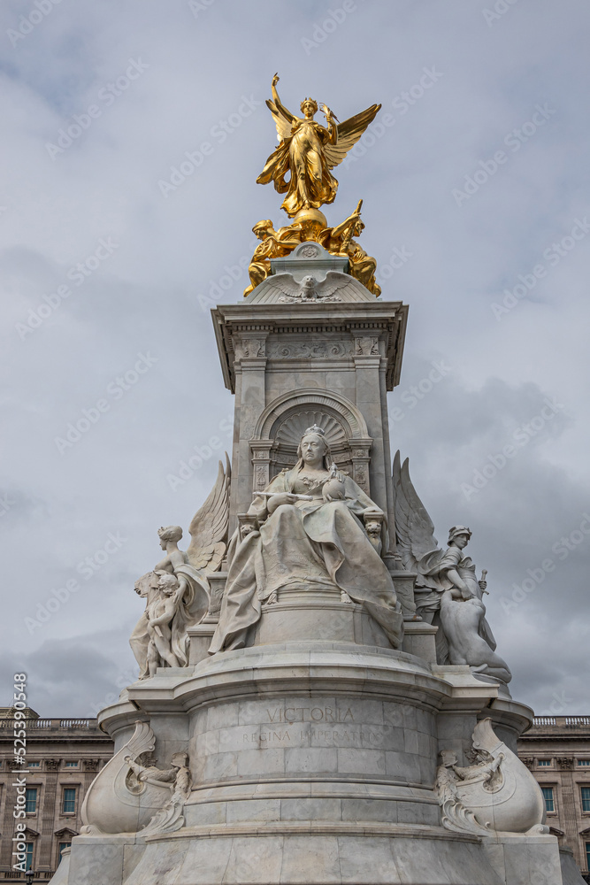 London, England, UK - July 6, 2022: Victoria Memorial. Enthroned queen with front view on golden Winged Victory. Buckingham Palace behind. Justice and Truth statues on sides