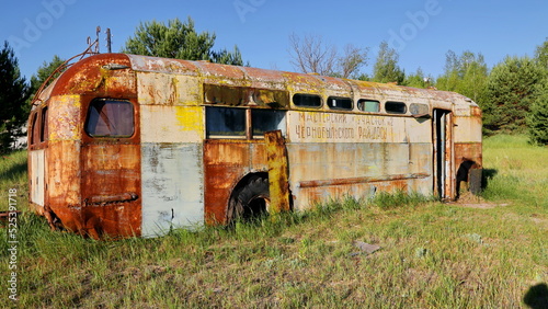 Abandoned bus in the Chernobyl exclusion zone. Dump of radioactive equipment.