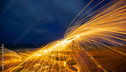 Steel wool and astrophotography, photographed at night with the long exposure technique. photo