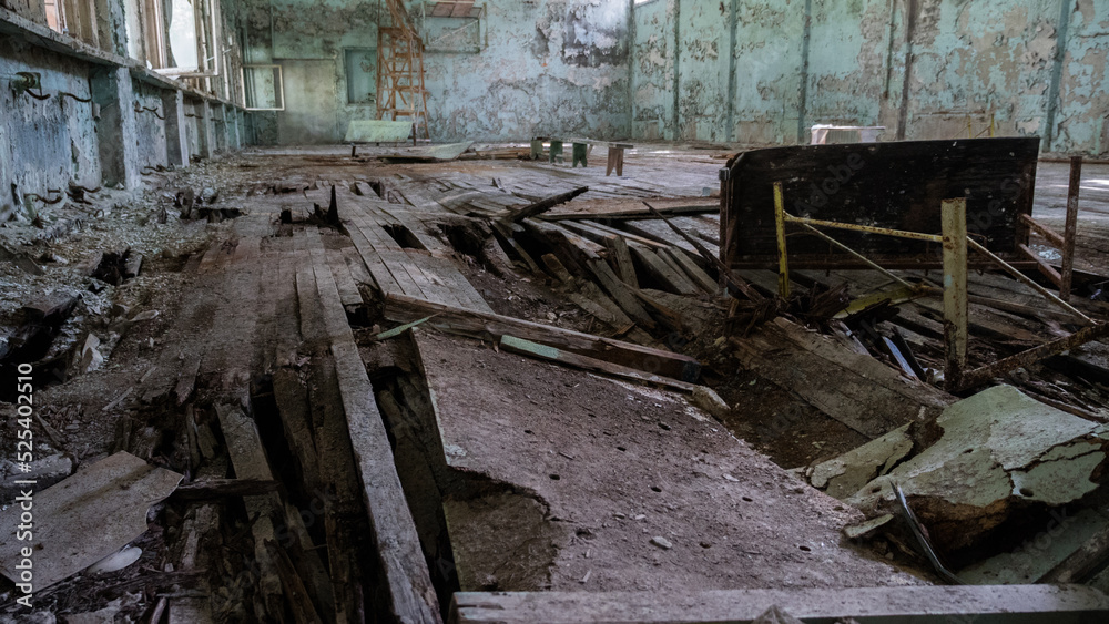 Inside sports complex destroyed abandoned building House Culture Energetik in ghost city Pripyat after explosion fourth reactor Chernobyl nuclear power plant. Exclusion Zone. Radiation. Ukraine