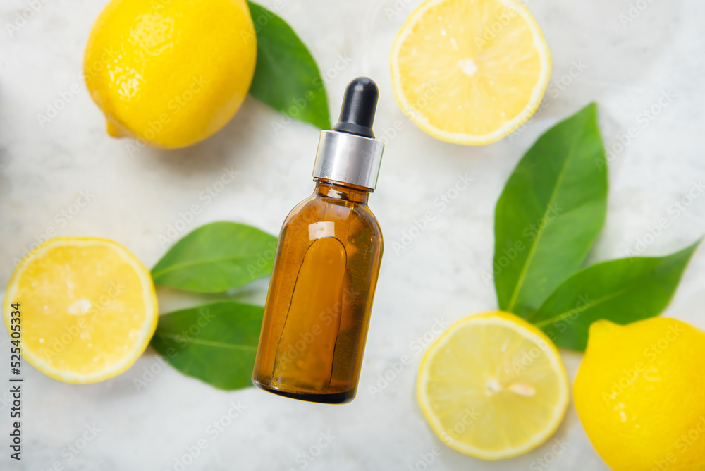 Lemon Essential Oil In A Bottle Withlemon Essential Oil In A Bottle With Lemon On The Side Lemon Essential Oil In A Bottle Withlemon Essential Oil In A Bottle With Lemon On The Side