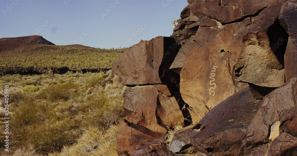 Petroglyphs on the sides of rocks in the Mojave Desert, California Petroglyphs on the sides of rocks in the Mojave Desert, California