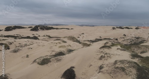 Aerial of sand dunes at Oceano Dunes SVRA at Pismo Beach, California photo