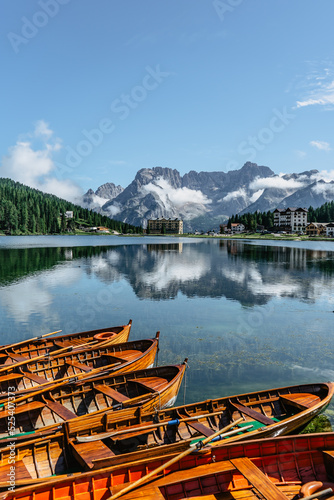 Obraz na płótnie Lake Misurina,Lago di Misurina is pearl of the Dolomites.Mountain lake in Italy with wooden boats,Veneto region,Sorapis mountain group.Perfect destination for hiking.Touristic resort for holiday w salonie