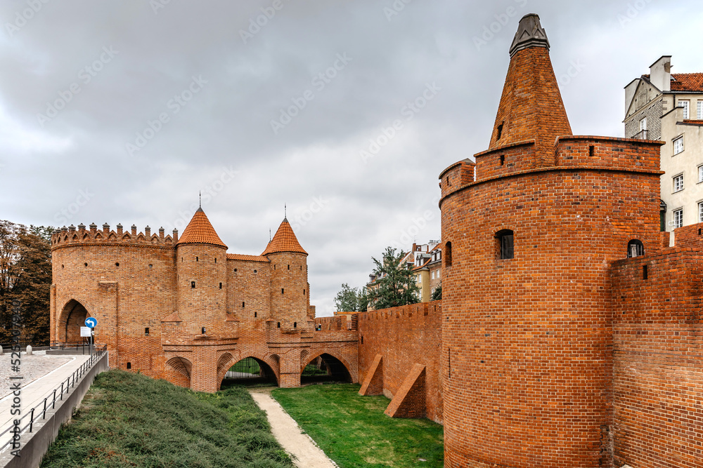 Warsaw Barbican,Poland.Network of hitoric walls, fortifications, and gates that surrounded the city.Shape as a three-level semicircular bastion.Towers and red brick walls of fort.