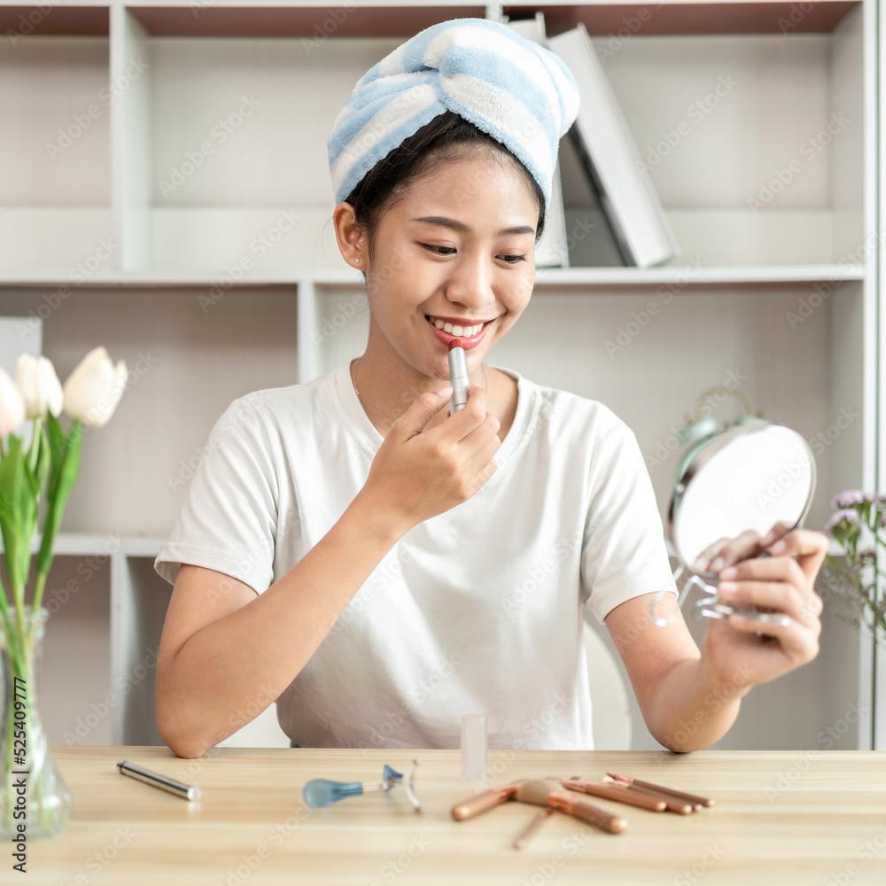 Half Japanese woman putting on makeup and hair to prepare for work in the morning, Facial care and cosmetics, Make up mirror,  Take a shower and put on make-up and get dressed and ready to go to work