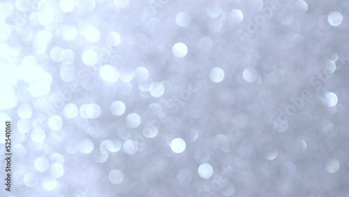 abstract bokeh background with glitter silver background on Christmas 