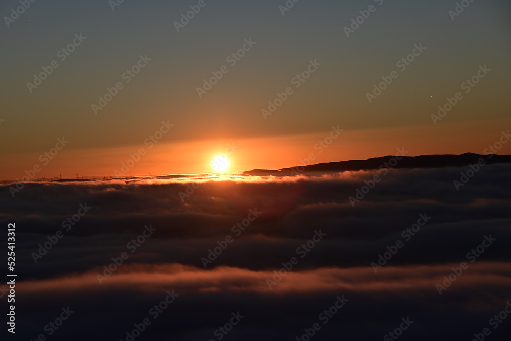 sun over the clouds