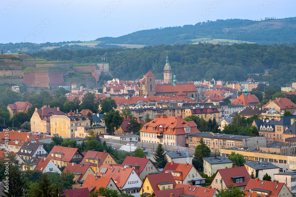 Ancient Polish city of Klodzko from above. View of the red tiled roofs from above