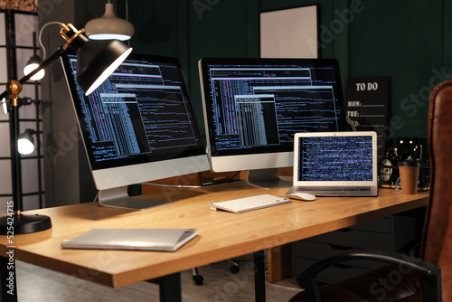 Modern workplace of programmer with computers