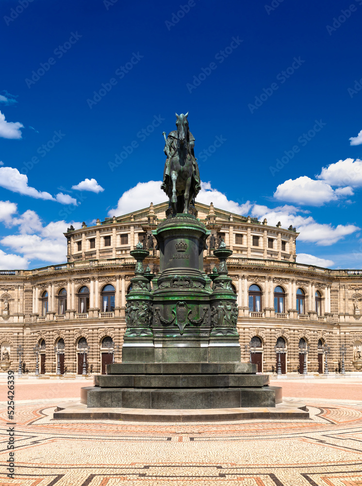 Equestrian statue of King Johann of Saxony at Theaterplatz, on the background of the Semperoper. Dresden, Germany