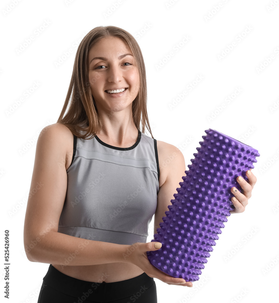 Young woman with foam roller on white background Young woman with foam roller on white background