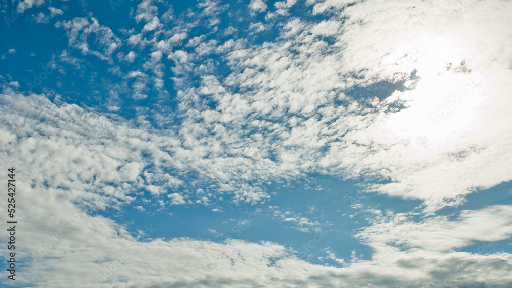 blue background, the photo shows a blue sky and clouds, bottom view blue background, the photo shows a blue sky and clouds, bottom view