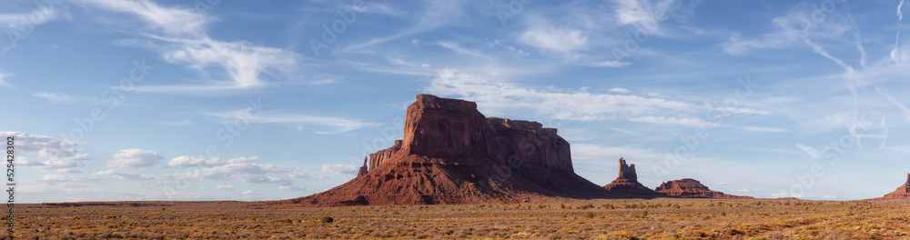 Desert Rocky Mountain American Landscape. Sunny Blue Sky Day. Oljato-Monument Valley, Utah, United States. Nature Background Panorama