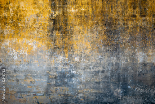 Fotografia Muro amarillo  y gris, desgastado y antiguo