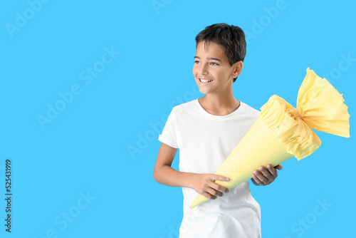 Little boy with yellow scho...