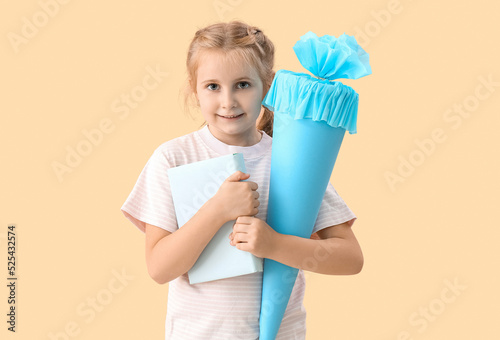 Cute little girl with blue ...