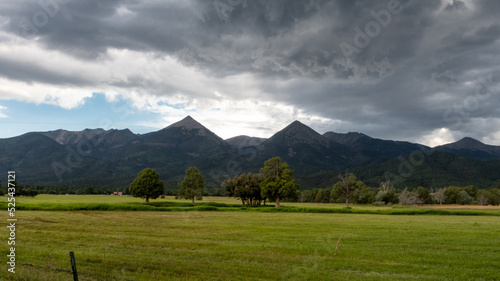 Twin sisters and Bushnell peaks from Howard, CO. photo