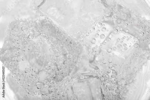 Top view of soda water with ice in glass