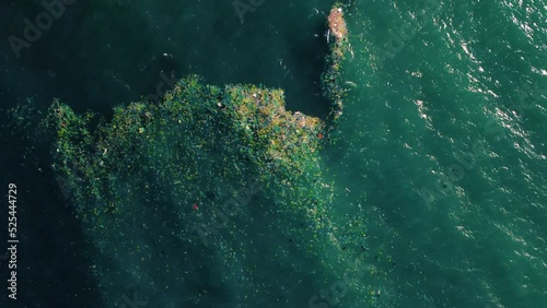 Aerial View Of Garbage Patch Floating In The Rubbish Sea In Vietnam. Water Pollution.