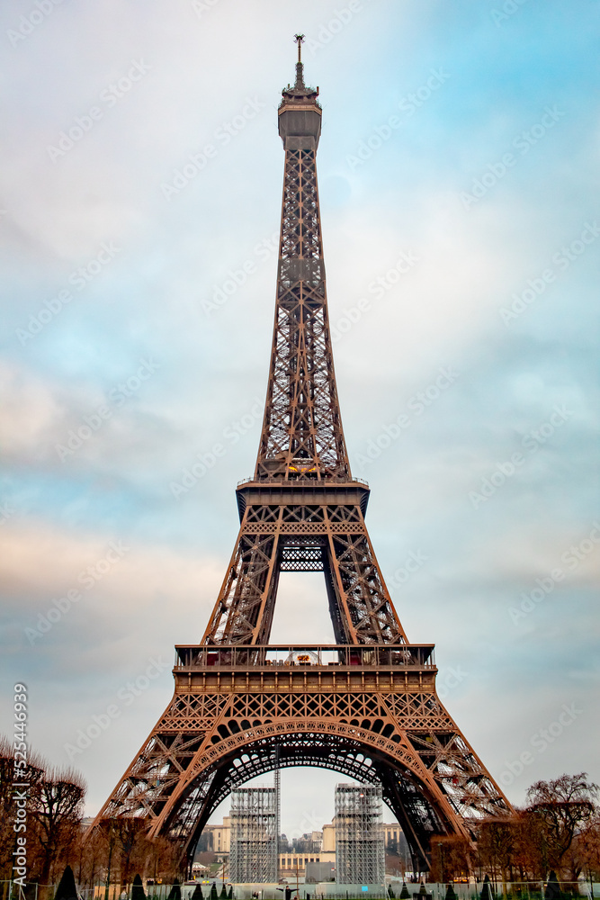 Romantic Eiffel Tower on a cold cloudy Paris France morning