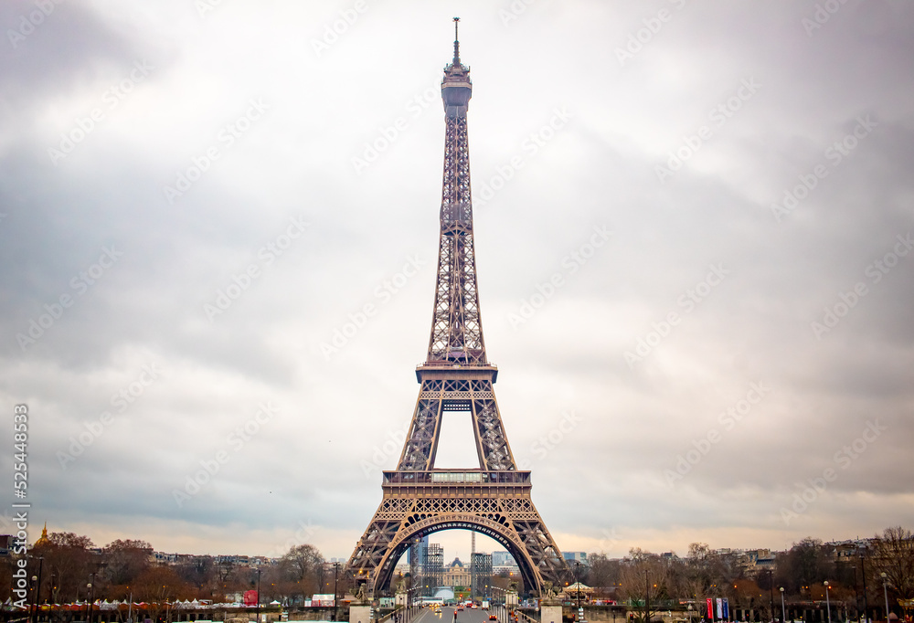 Naklejka premium Romantic Eiffel Tower on a cold cloudy Paris France morning 
